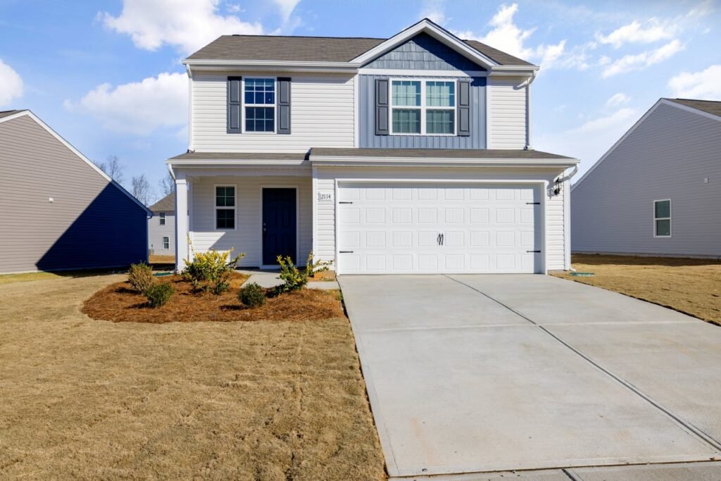 White and Blue House Under Blue Sky fix by Garage Door Repair Alpine, NJ